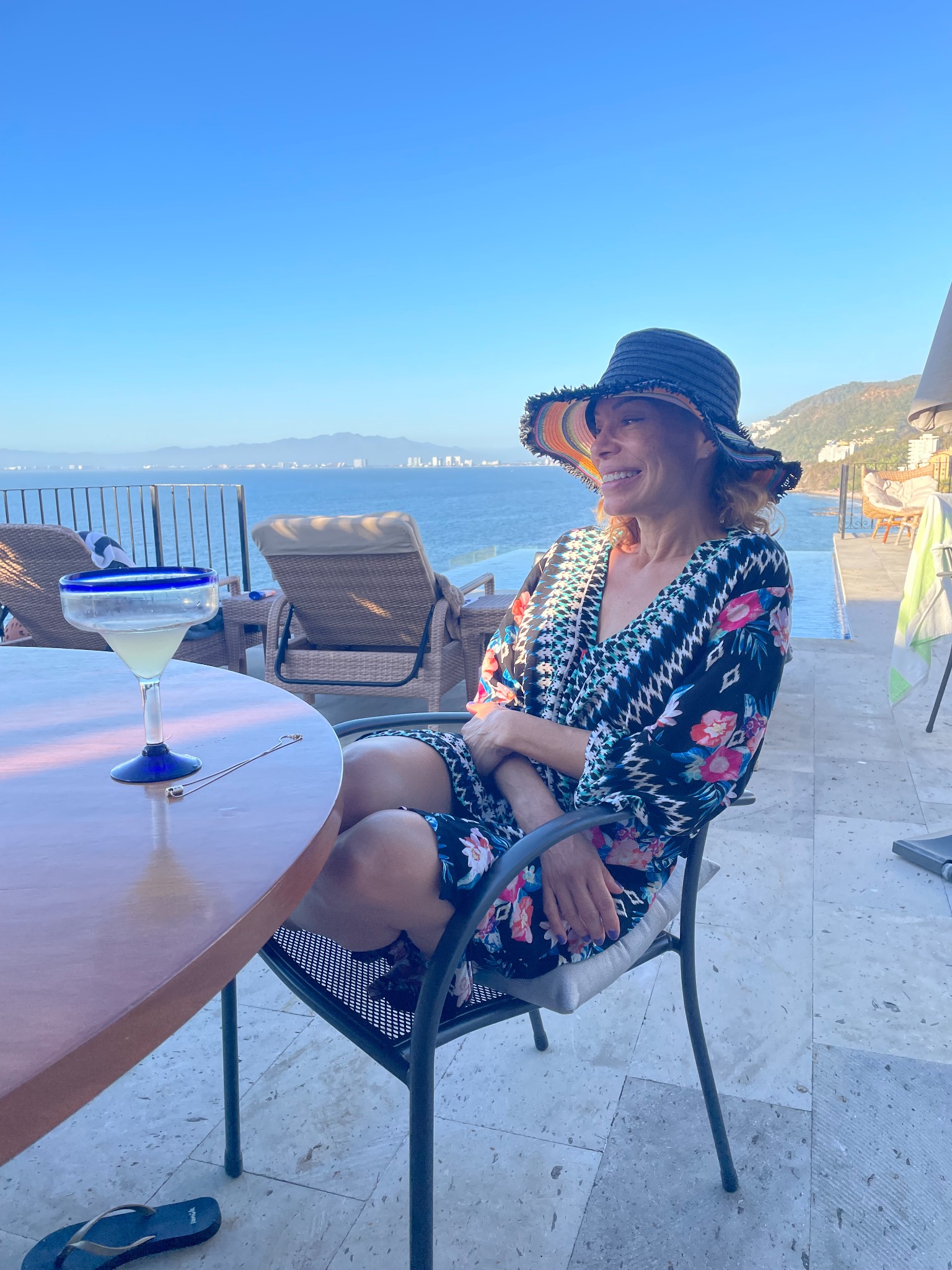 Charis Rey smiling by the Southern California coast